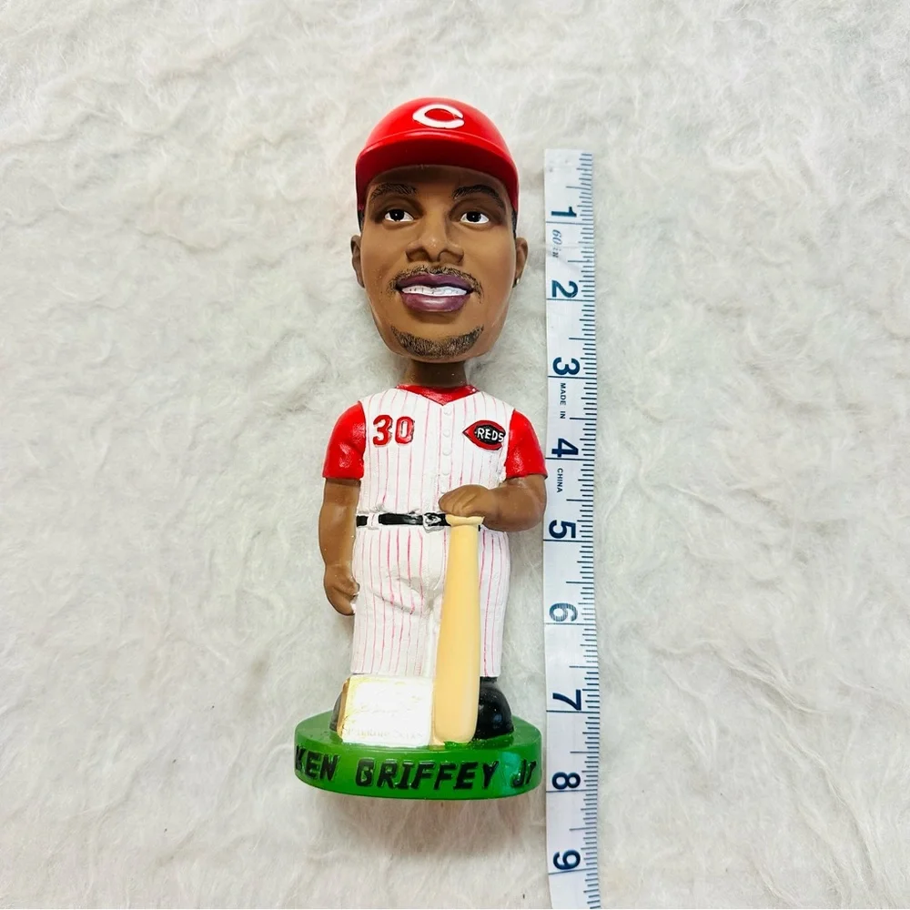 Sports-Themed Bobblehead Set - Red and White 70% good.
